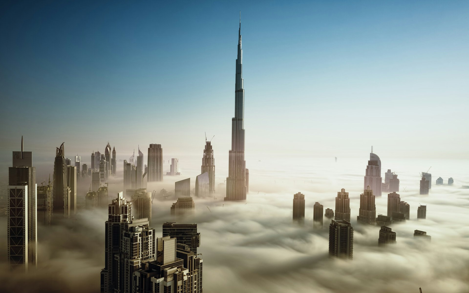 Dubai Downtown Skyline in early morning fog, United Arab Emirates © Naufal MQ / Getty Images