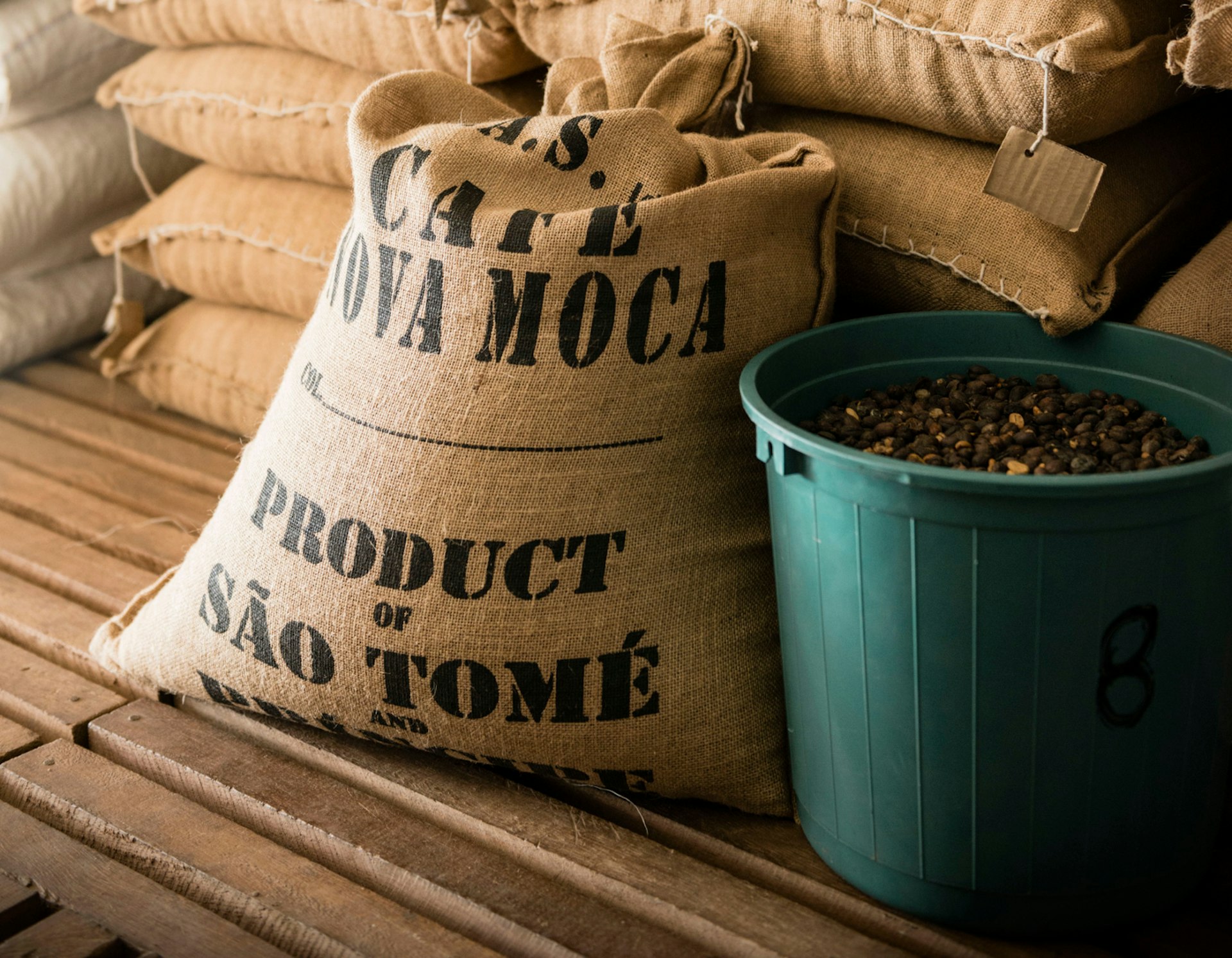 Cocoa beans in hessian sacks ready for export reading Product of São Tomé and Príncipe © Justin Foulkes / Lonely Planet