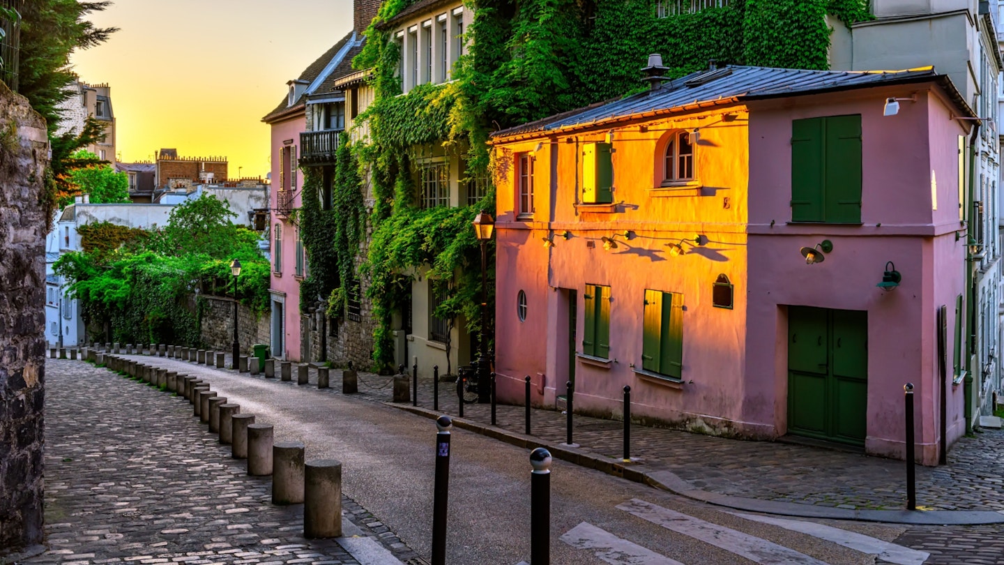 The sun sets over the Montmartre quarter in Paris, France © Catarina Belova/Shutterstock