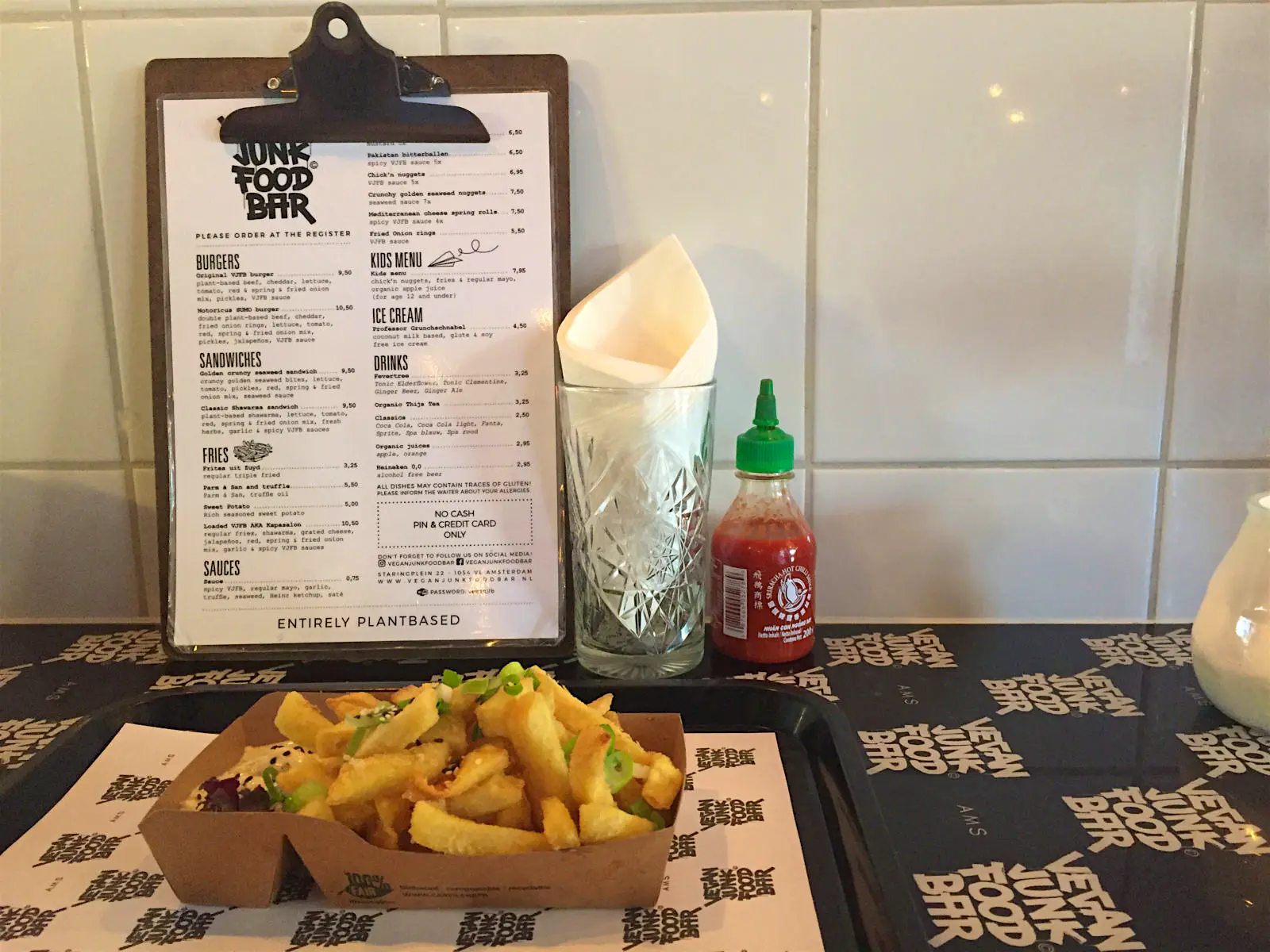 Features - vegan-junk-food-bar-3-edit_mini-acb73a891272 A box of chips at Vegan Junk Food Bar in Amsterdam, The Netherlands © Claire Bissell / Lonely Planet