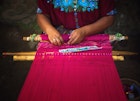 Features - mayan woman weaving on loom