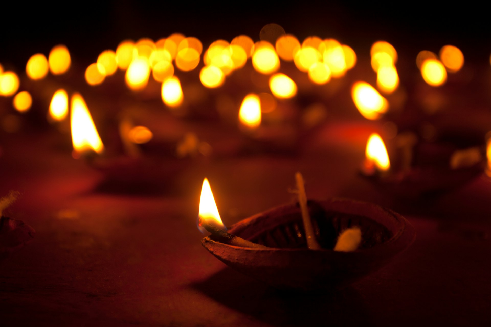 Diyas(clay oil lamps)glowing in kali Puja Festival