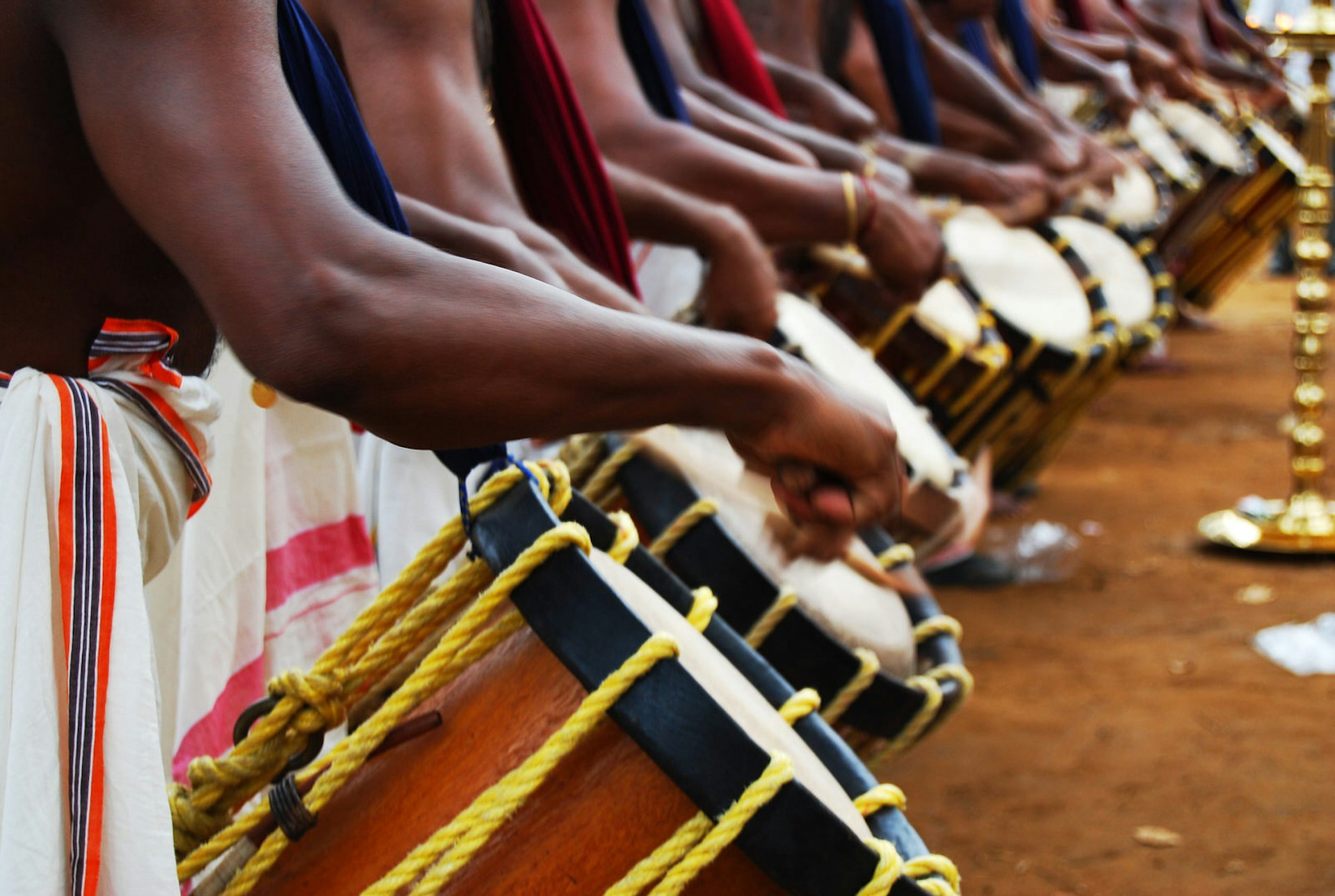 A group of musicians play the chenda melam in Kerala, India © Smevins Photography / Getty Images