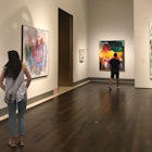 Museum visitors walk among the artwork at the Museum of Fine Arts Houston © Lisa Dunford / Lonely Planet