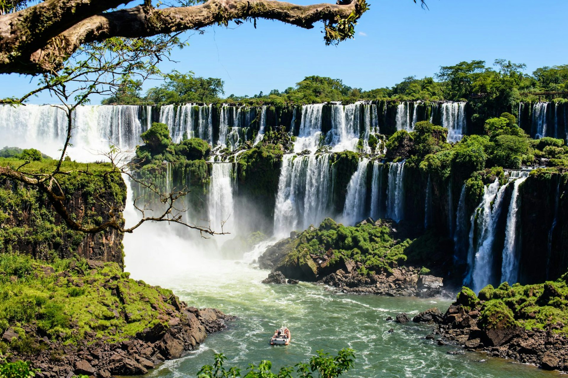 Wide shot of Iguazu Falls' two tiered cascades from the Argentina side © Det-anan / Shutterstock