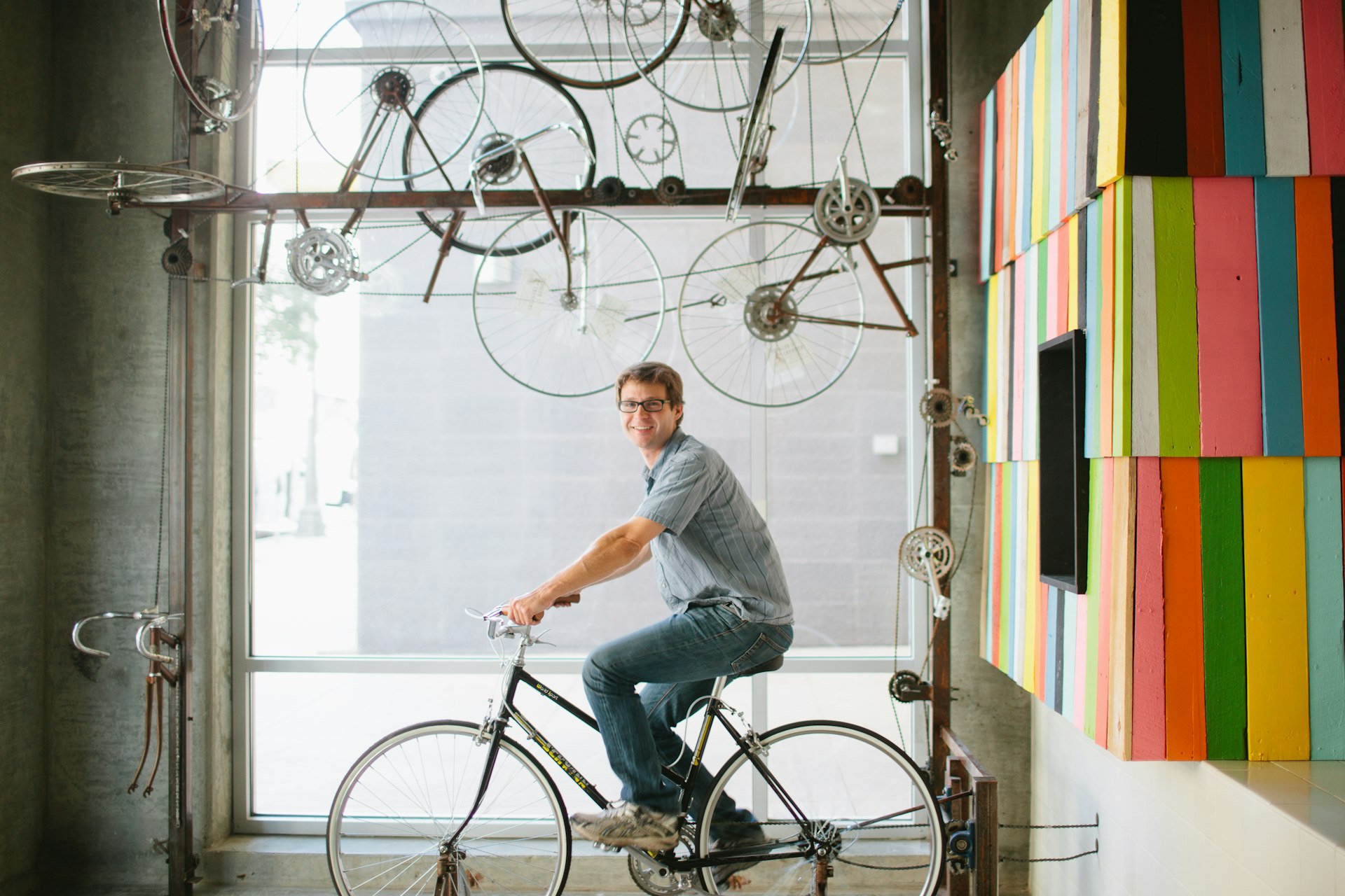 Man peddles a stationary bike © Peddler's Creamery