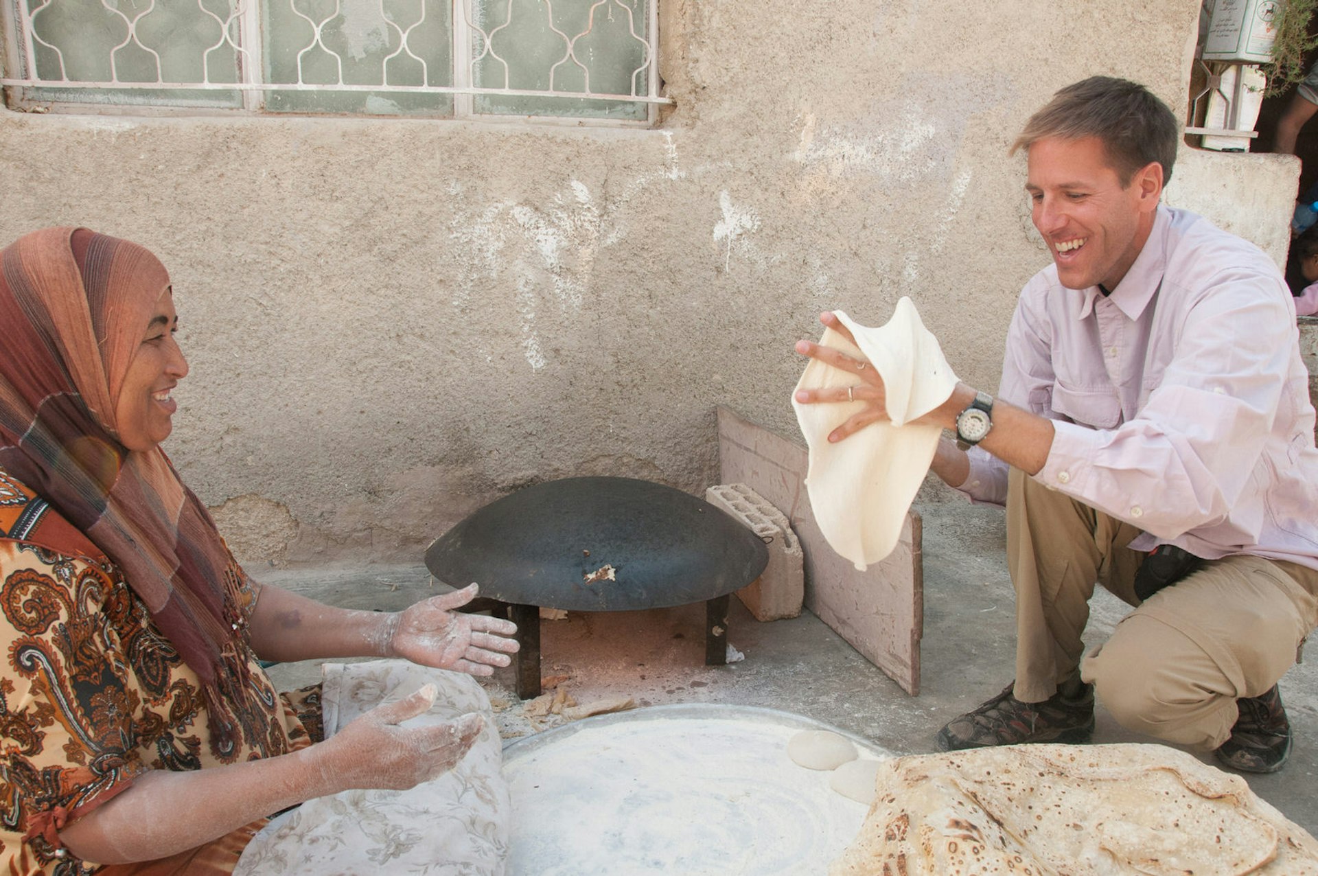 Getting hands on with shrak, a traditional bread, with the Zikra Initiative, a social enterprise in Jordan © Uncornered Market