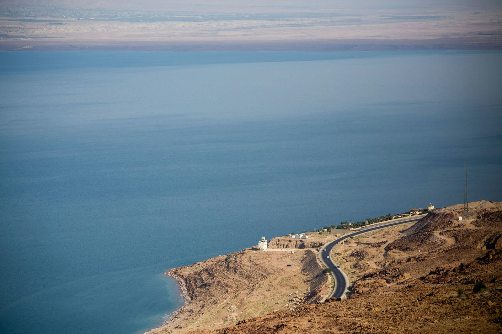 Highway curves along the coast of the Dead Sea in Jordan © Stephen Lioy / Lonely Planet
