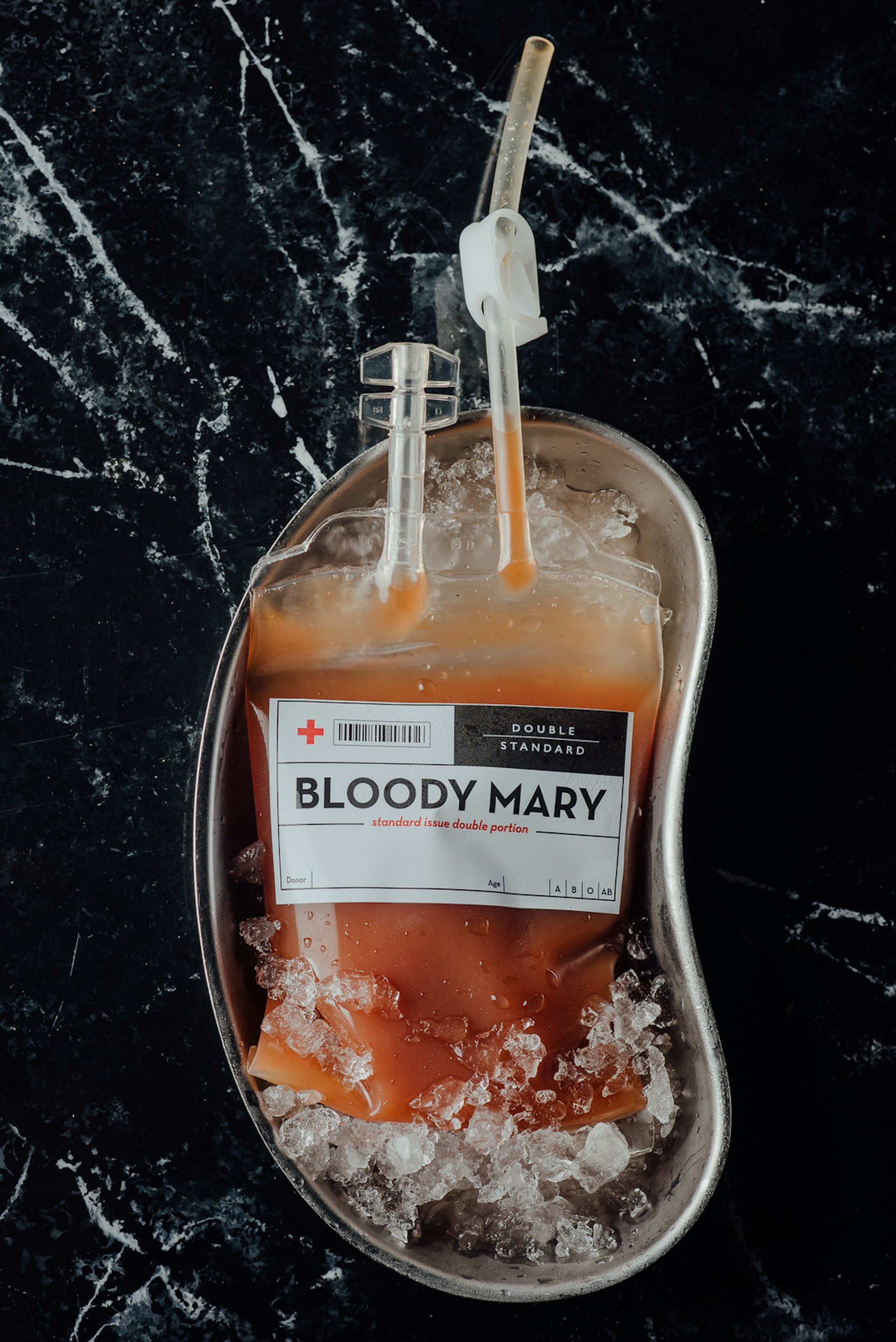 Bloody Mary in a blood bag in a bedpan filled with ice at Double Standard, Tel Aviv, Israel © Double Standard