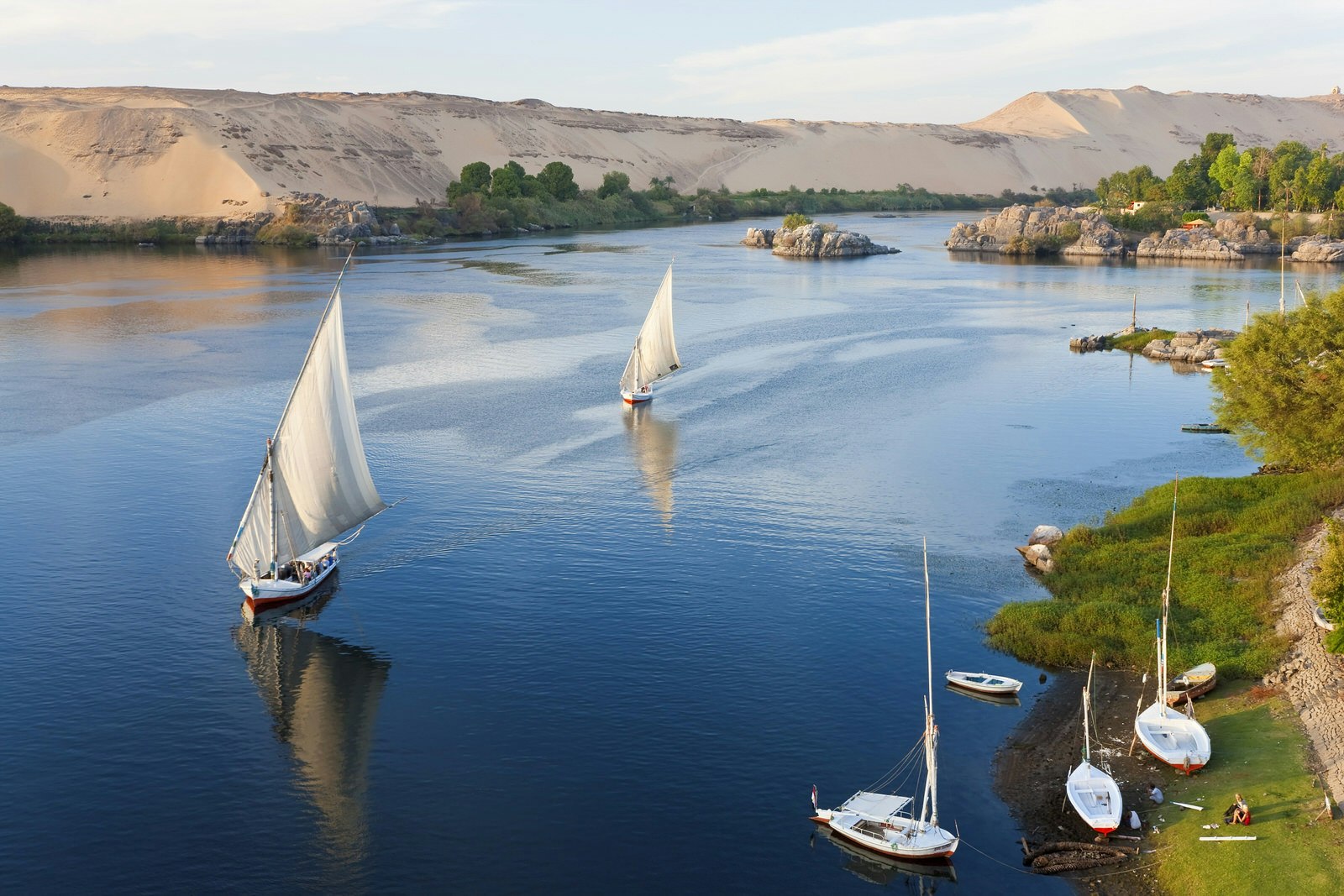 Felucca sailboats on the River Nile in Aswan, Egypt © Peter Adams / Getty Images