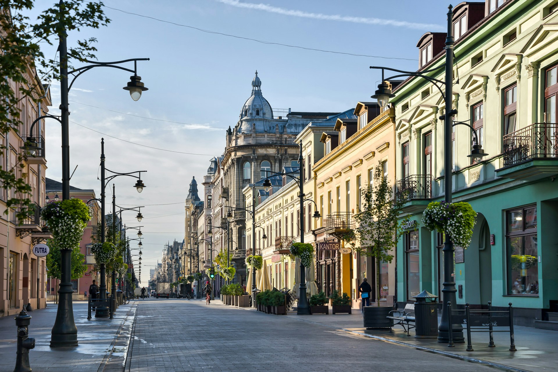 A view down Łódź's ul Piotrkowska, the longest street in Poland, with its ornate restored 19th-century facades © Avillfoto / Shutterstock