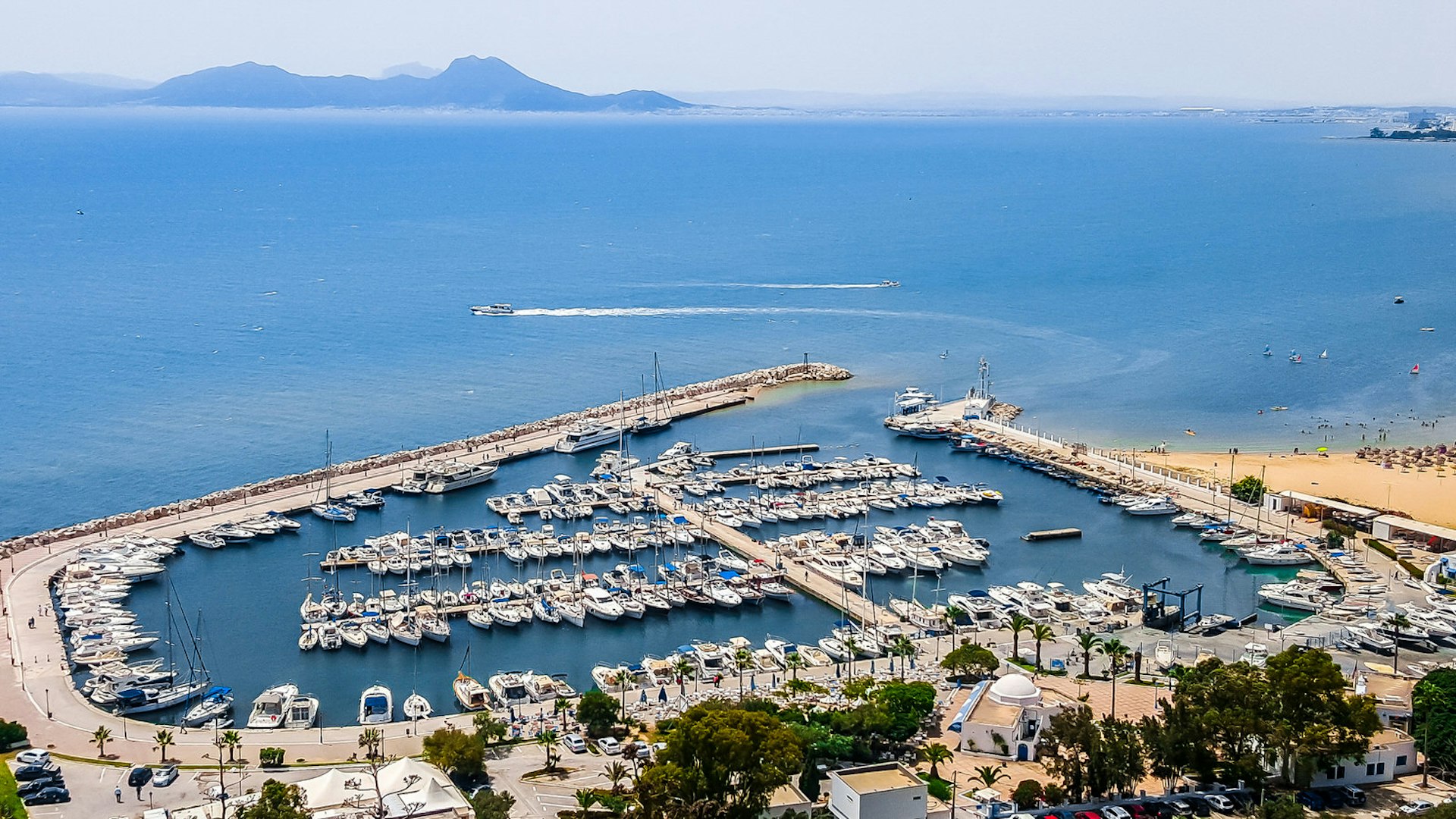 Aerial view of the port of Sidi Bou Said, Tunisia, full of boats © Zabotnova Inna / Shutterstock