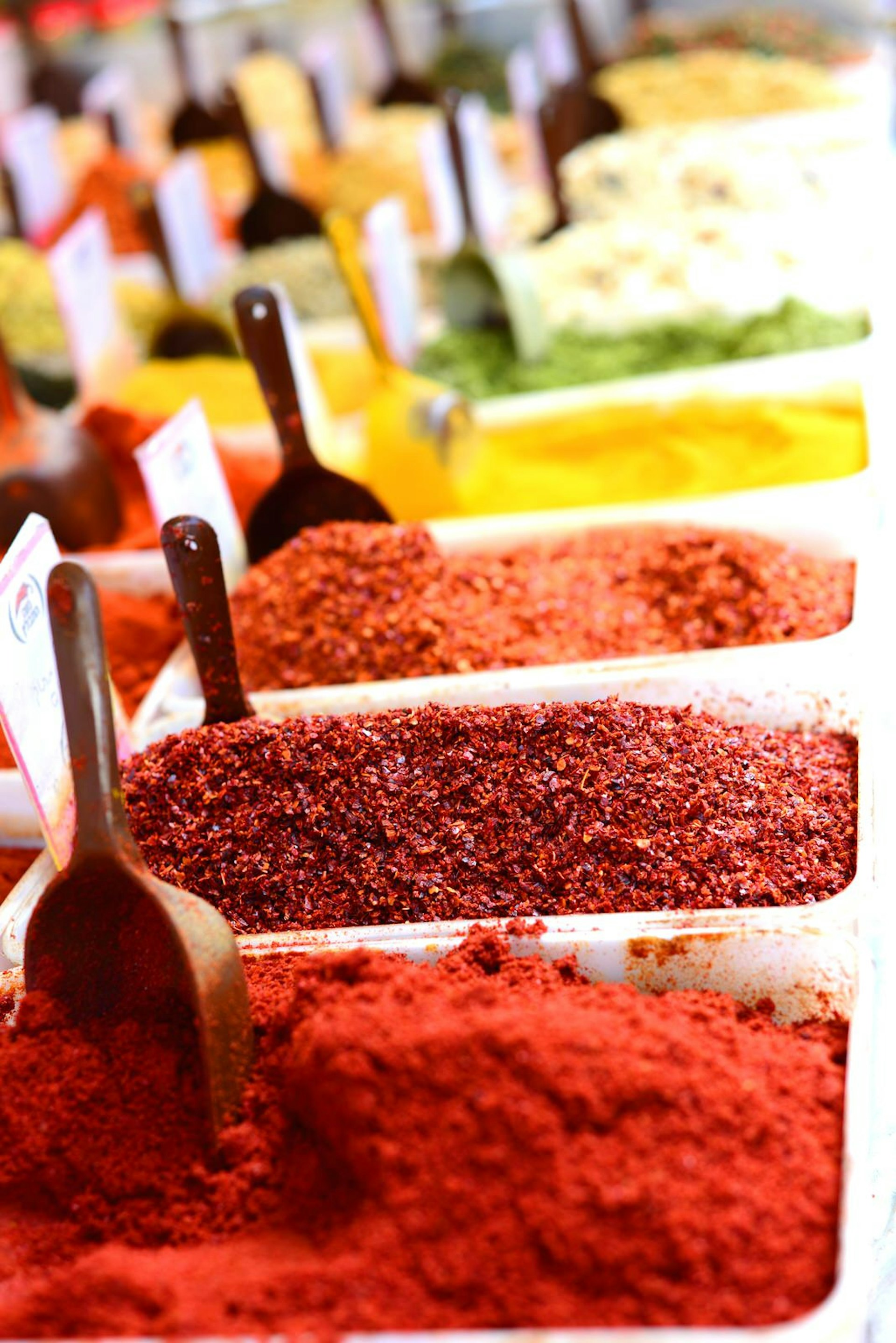 Close-up of colourful spices and herbs at Carmel Market, Tel Aviv.