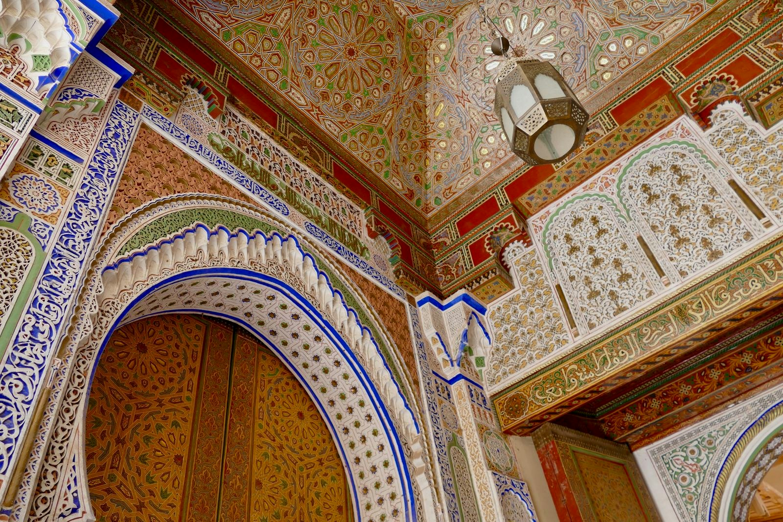 Recently restored painted wood and stucco work in Fez medina, Morocco