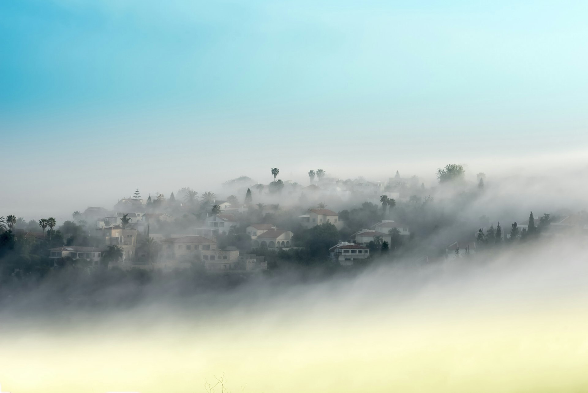 Mountainous rural village covered in mist, Carmel Mountain, Israel