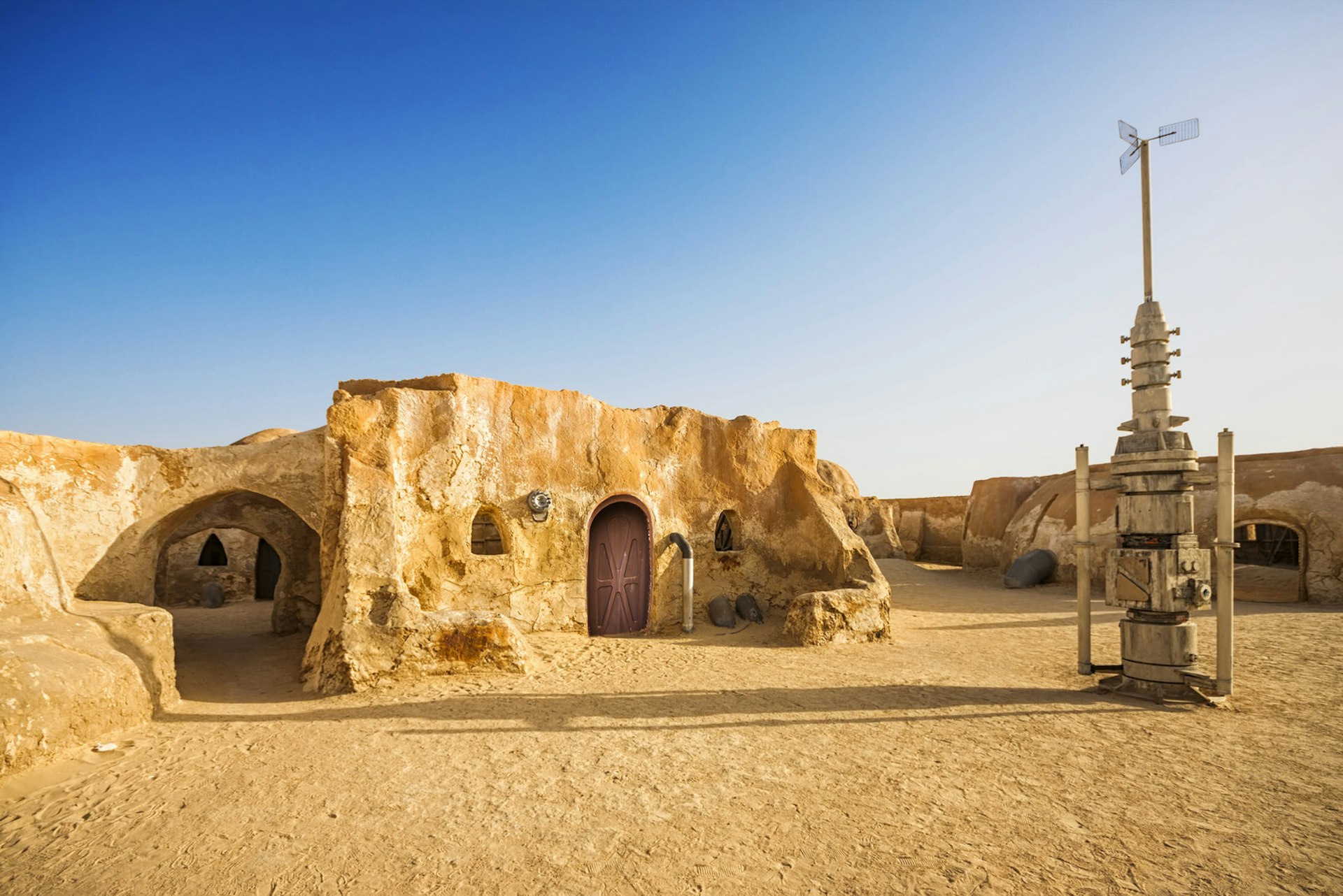 Abandoned sets for the shooting of the movie Star Wars in the Sahara desert on a background of sand dunes in Tunisia