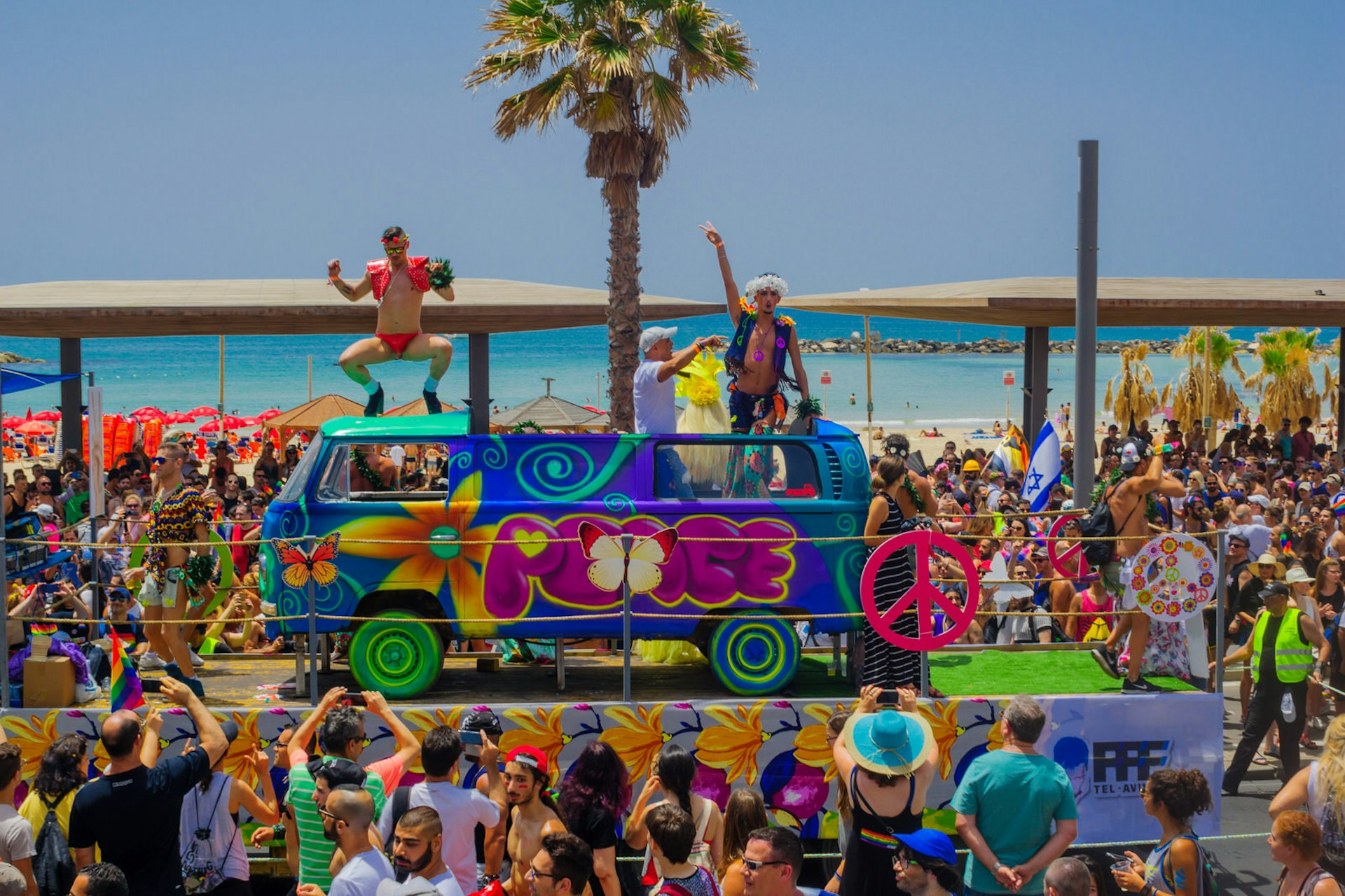 Dancers on a truck entertain the crowd in the Pride parade in the streets of Tel Aviv.