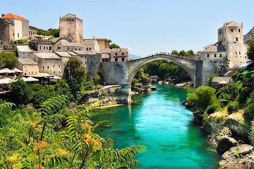 The elegant arch of Stari Bridge spans the turquoise waters of the river Neretva