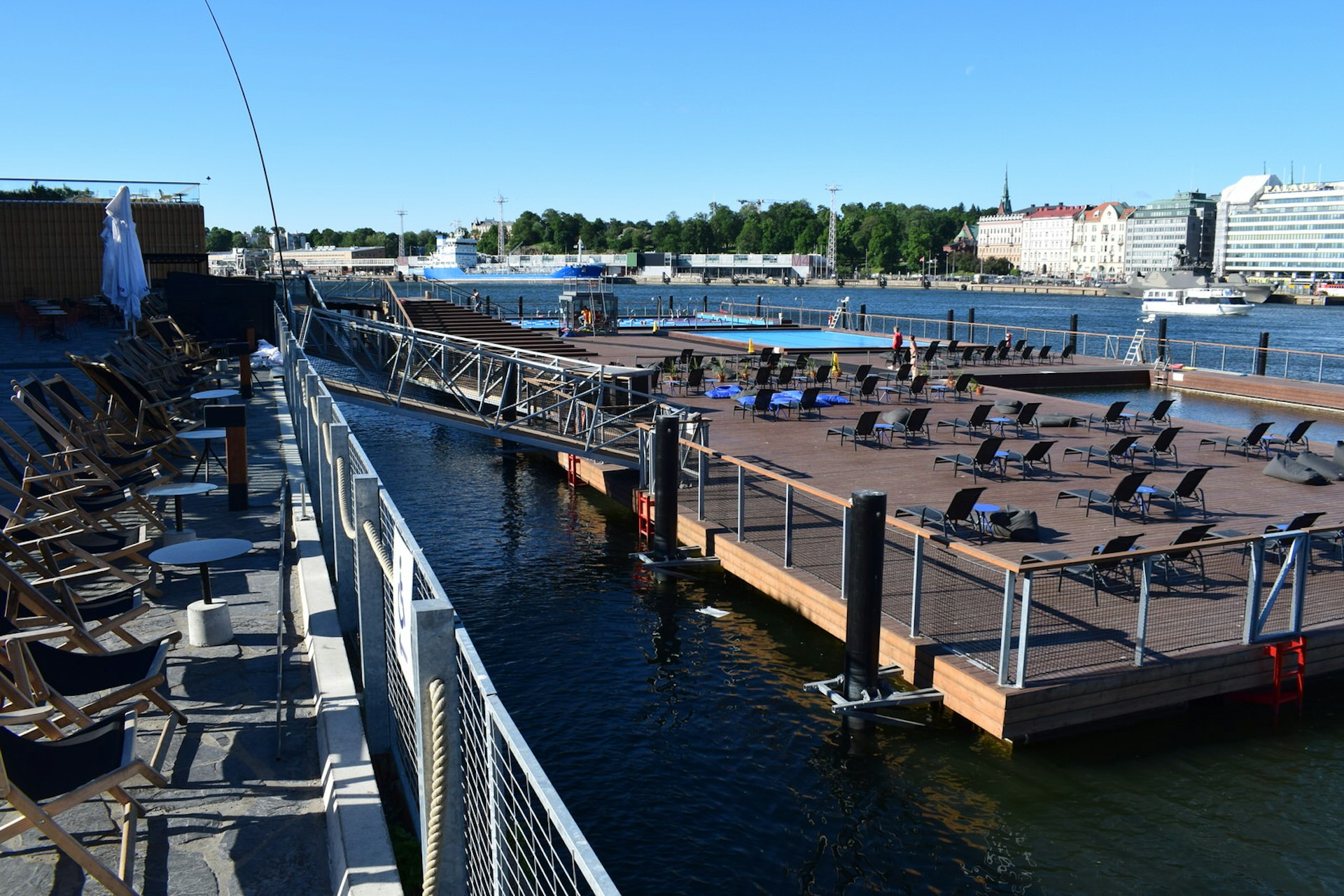 A floating deck with outdoor pools and loungers at Allas Sea Pools in Helsinki © Violetta Teetor / Lonely Planet