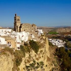 The Gothic-baroque Iglesia de San Pedro, seen from the terrace at the Parador de Arcos de la Frontera