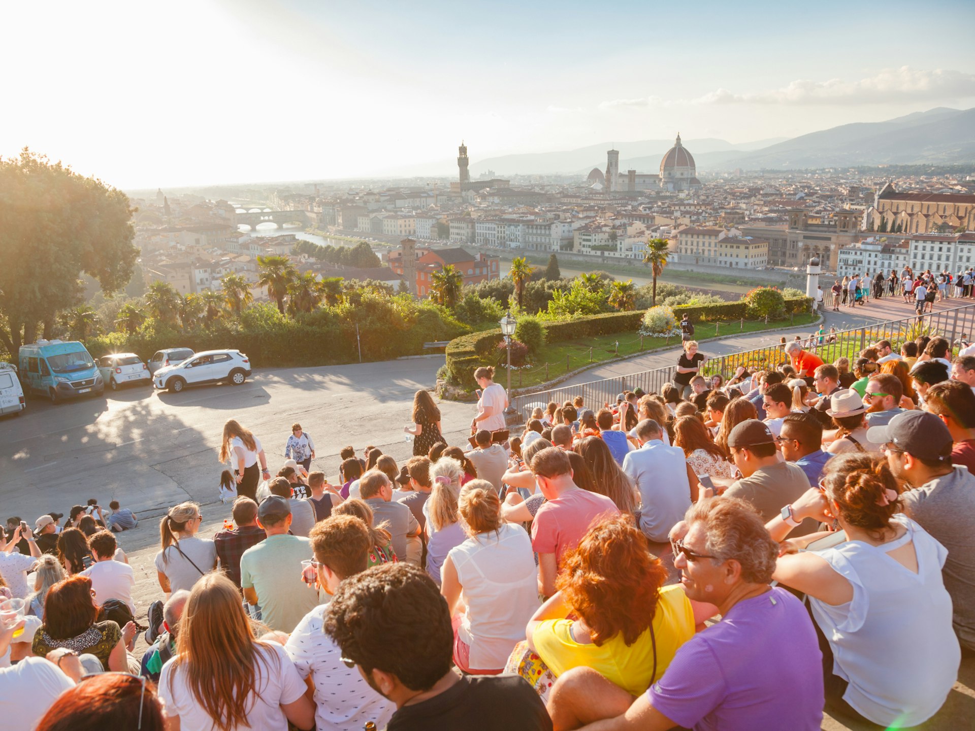 Crowds gather to watch the sun set from Piazzale Michelangelo. Little do they know the real show starts once the night is in full effect
