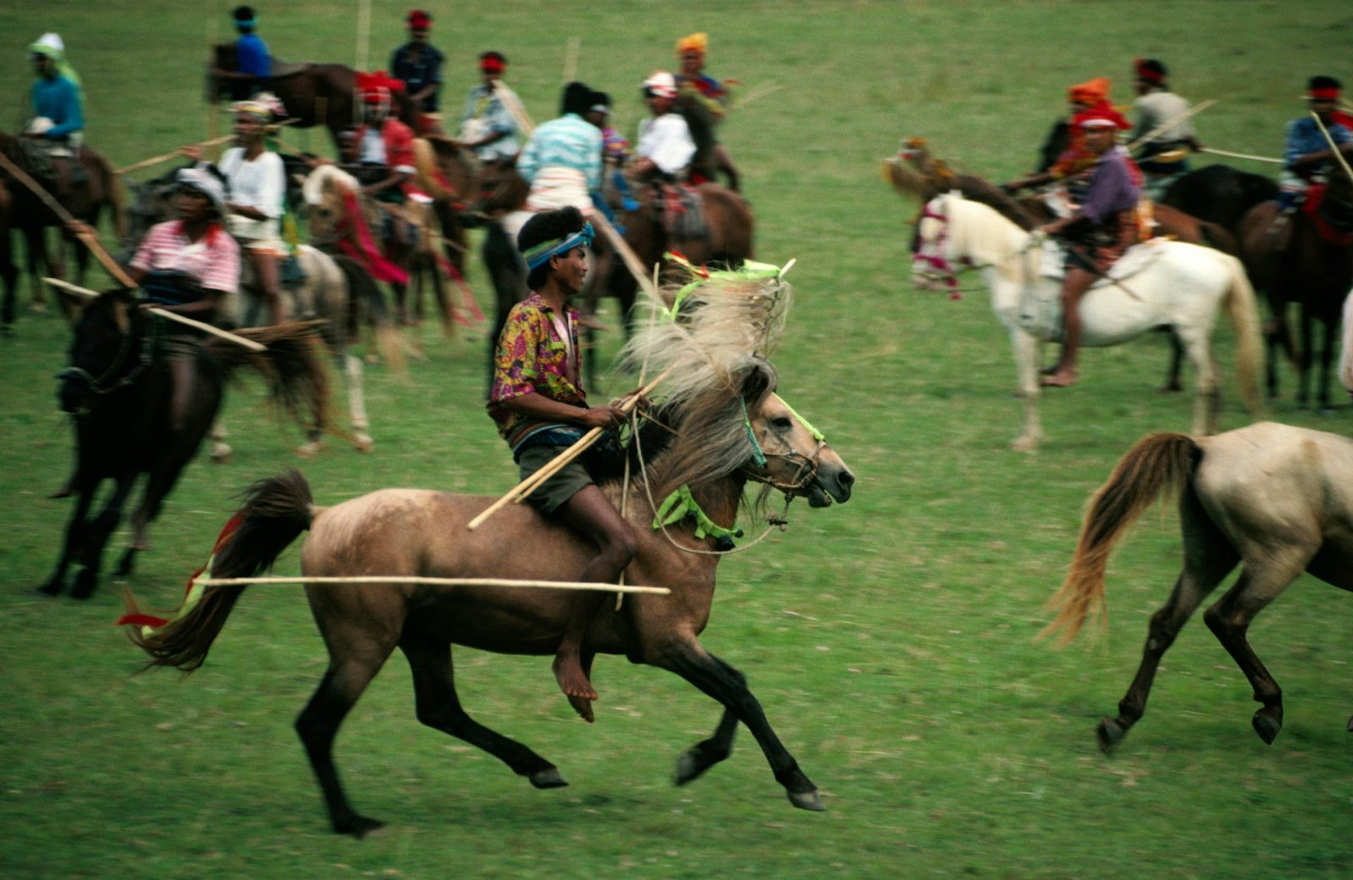 Horsemen and flying spears at the annual festival of Pasola in Sumba, East Nusa Tenggara, Indonesia