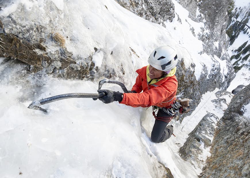 A woman ice-climbing at Ouray, Colorado