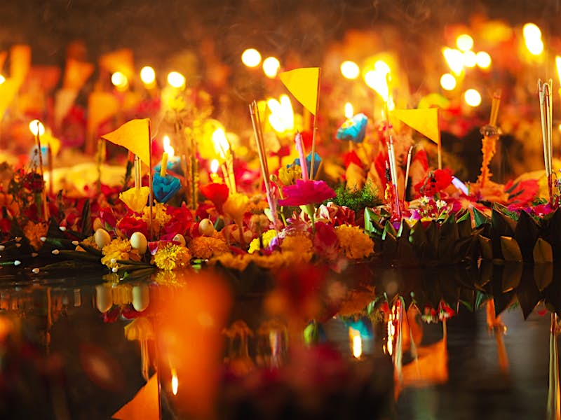 Decorative krathong, or floating banana leaf boats, are sent out to river to pay respects to the Goddess of Water 