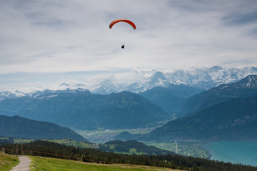 Features - Paraglider in Swiss Alps