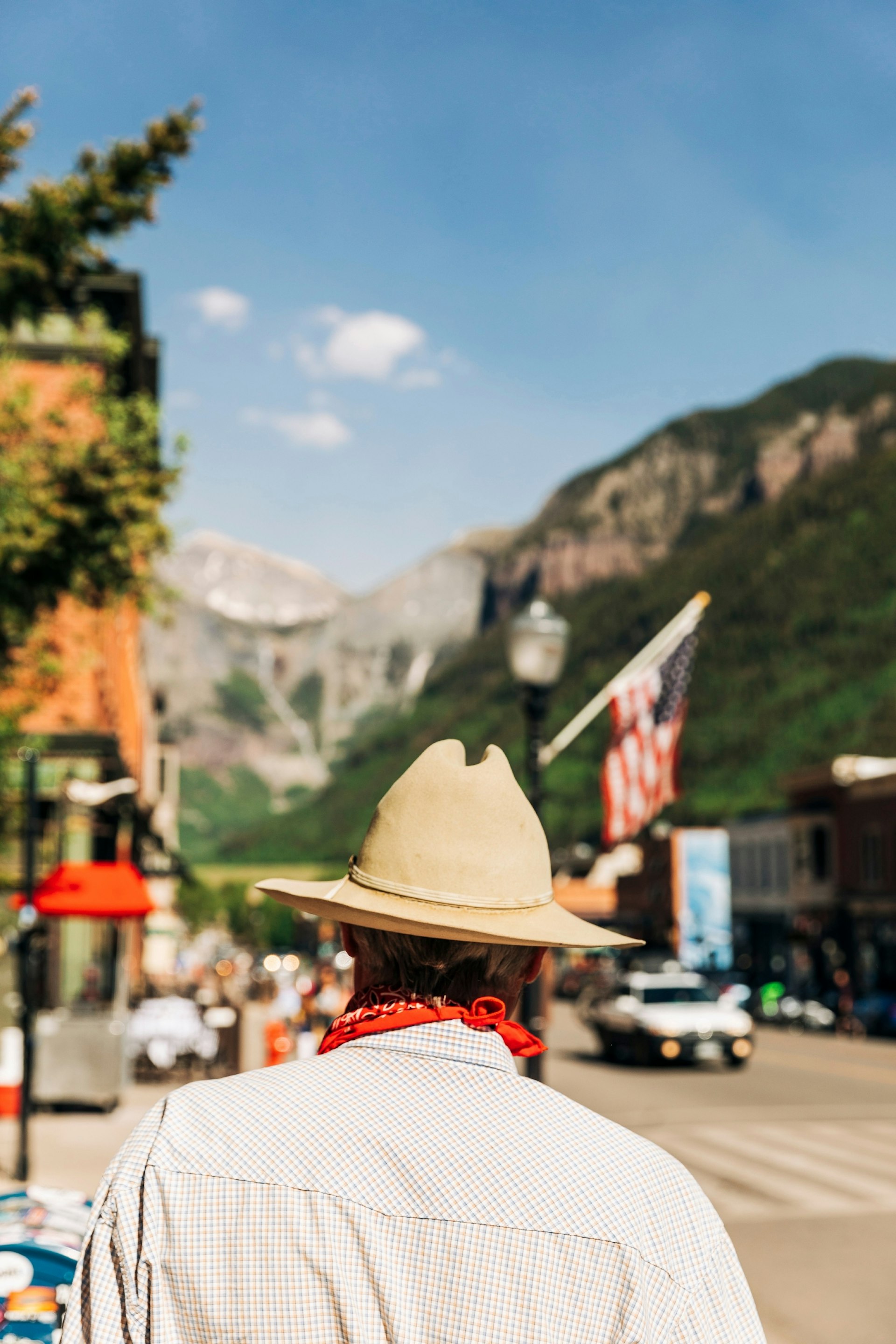 Man in cowboy hat on street in Telluride