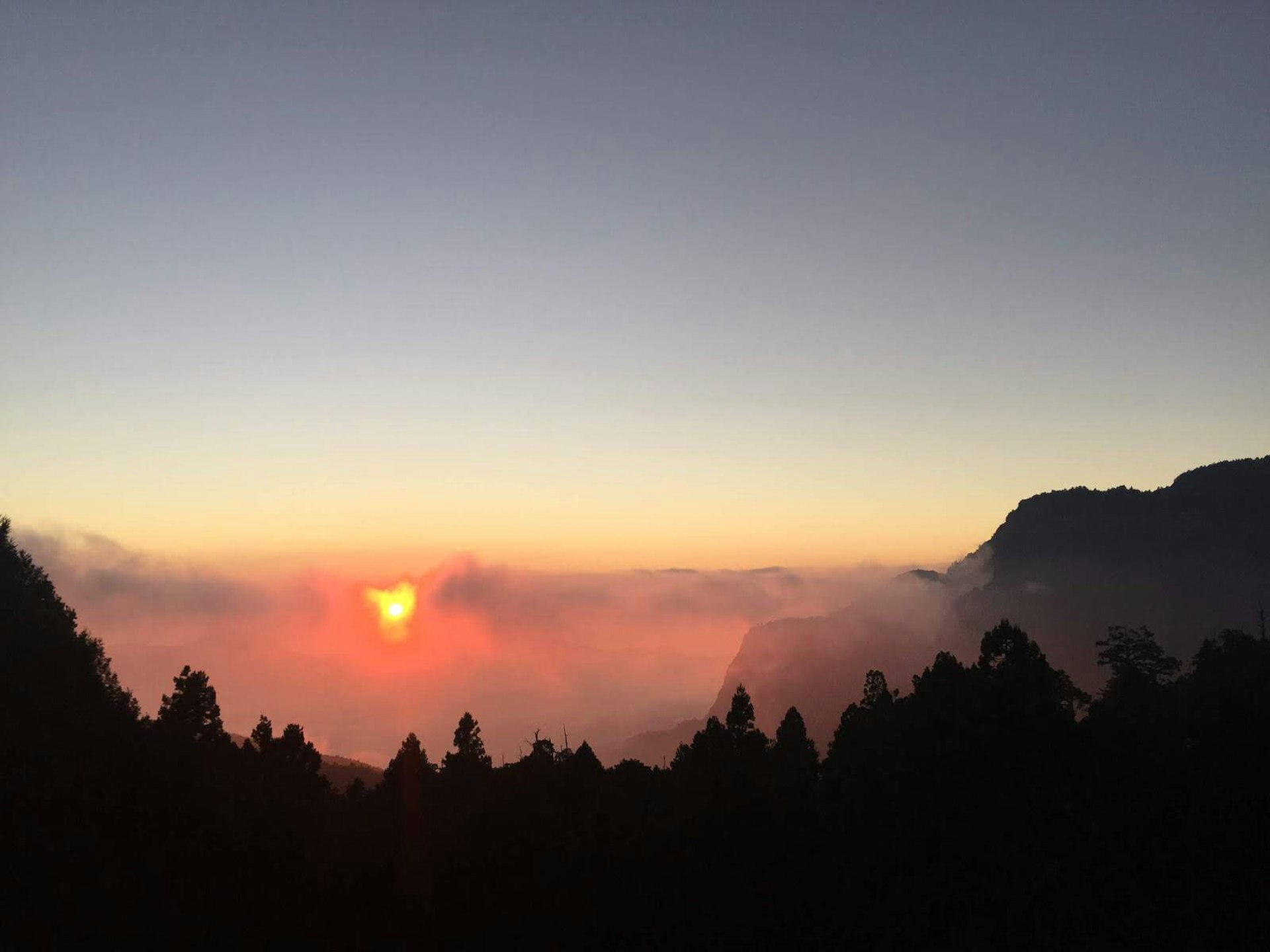 View of the sunset from the rooftop deck of the Alishan House Hotel © Megan Eaves / Lonely Planet
