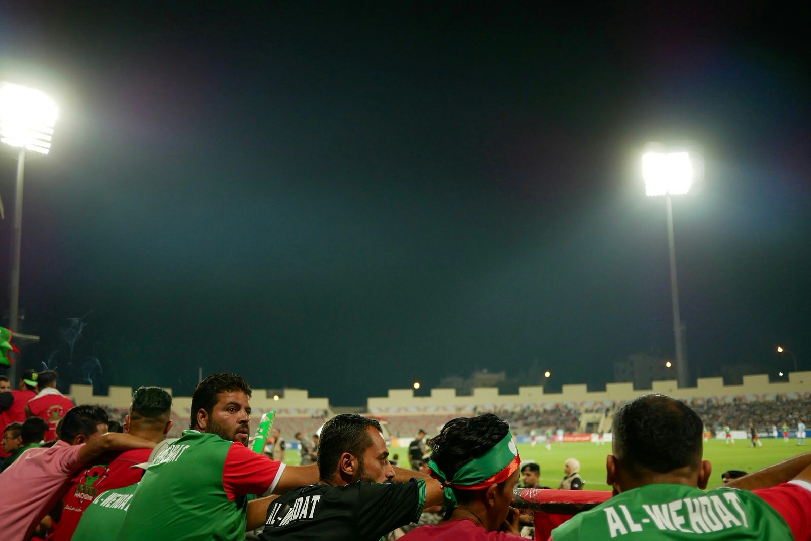 Wehdat fans at a football match against Al Faisaly near Amman, Jordan