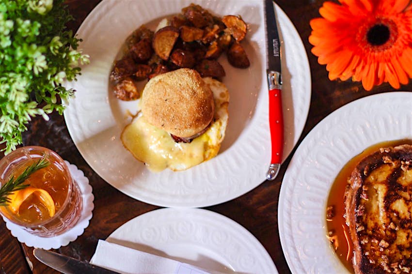 Looking down on a table covered in different brunch foods in Toronto