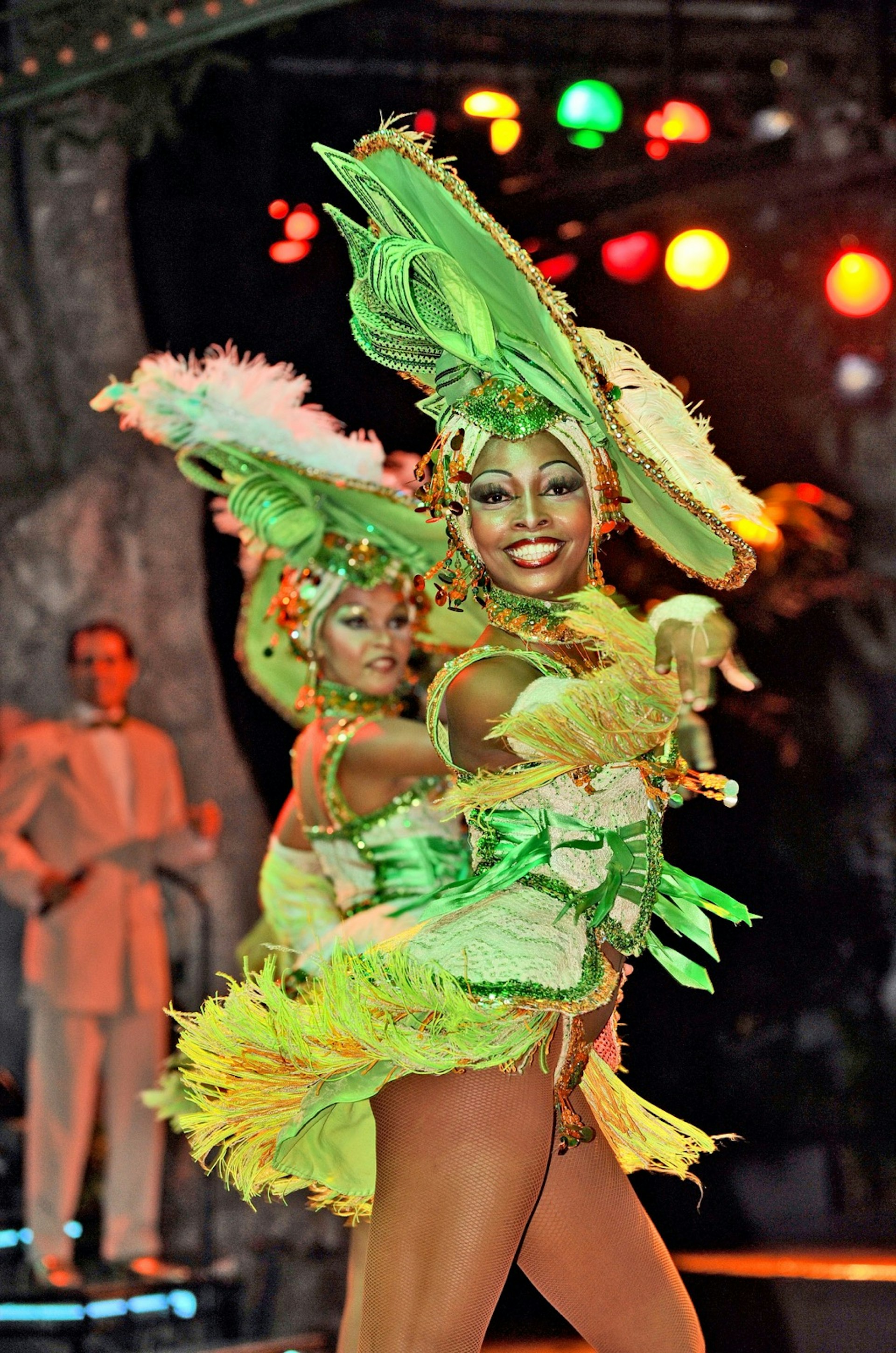 A pair of performers dance during a show at the Cabaret Tropicana  © The Visual Explorer/ Shutterstock