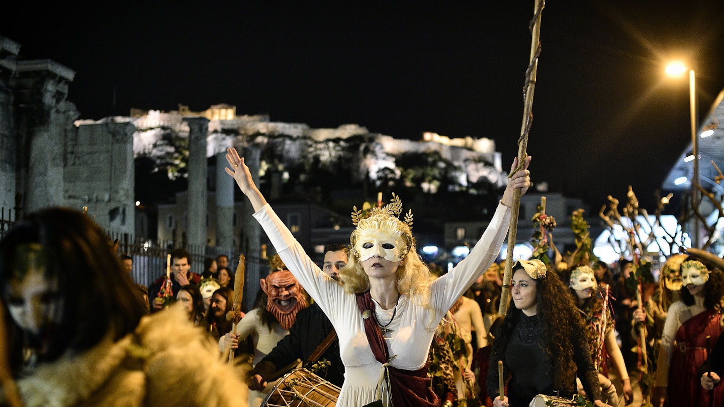 Revellers march through the streets of the Monastiraki district in Athens during Apokries © Louisa Gouliamaki / AFP / Getty Images