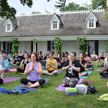 Features - Austen-HouseYoga-on-the-lawn-d49dee9bb351