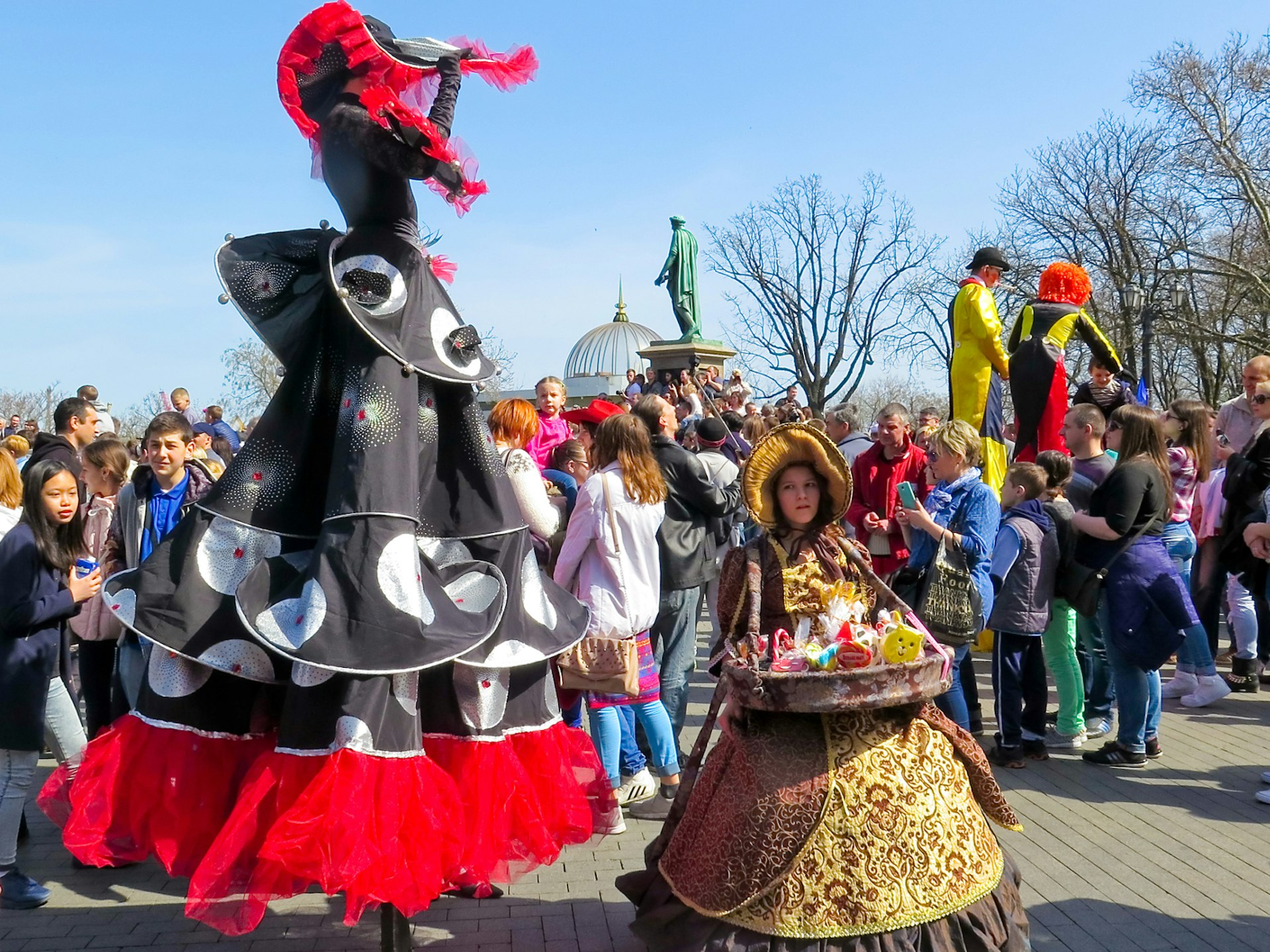 People in carnival costumes take part in the parade during the Carnival Humorina in Odesa