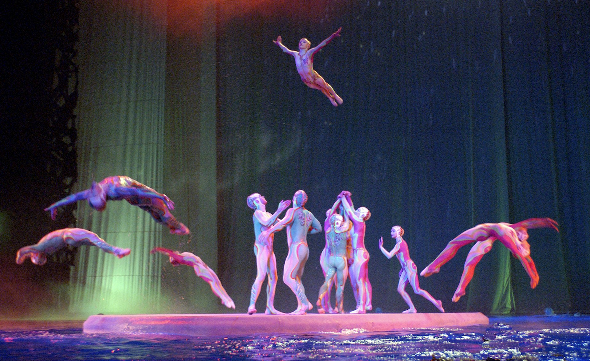 Acrobats of Cirque du Soleil performing Barge from "O" in Las Vegas