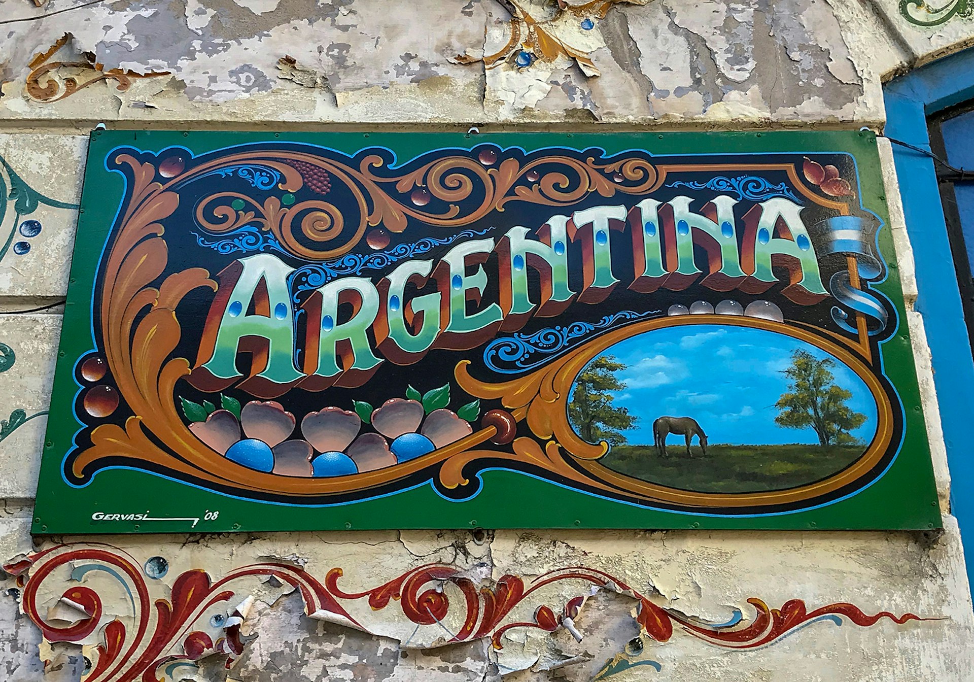 An image of a sign that reads "Argentina" in decorative lettering against a green background