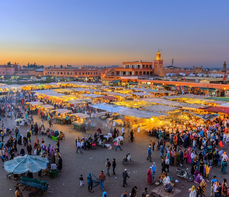 Features - Evening Djemaa El Fna Square with Koutoubia Mosque, Marrakech, Morocco