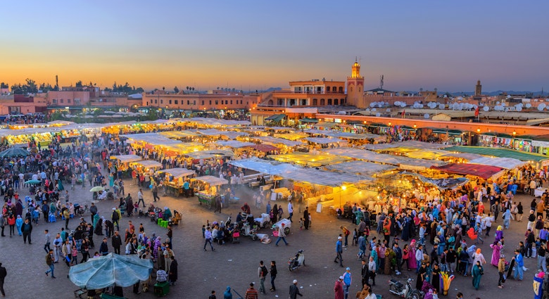 Features - Evening Djemaa El Fna Square with Koutoubia Mosque, Marrakech, Morocco