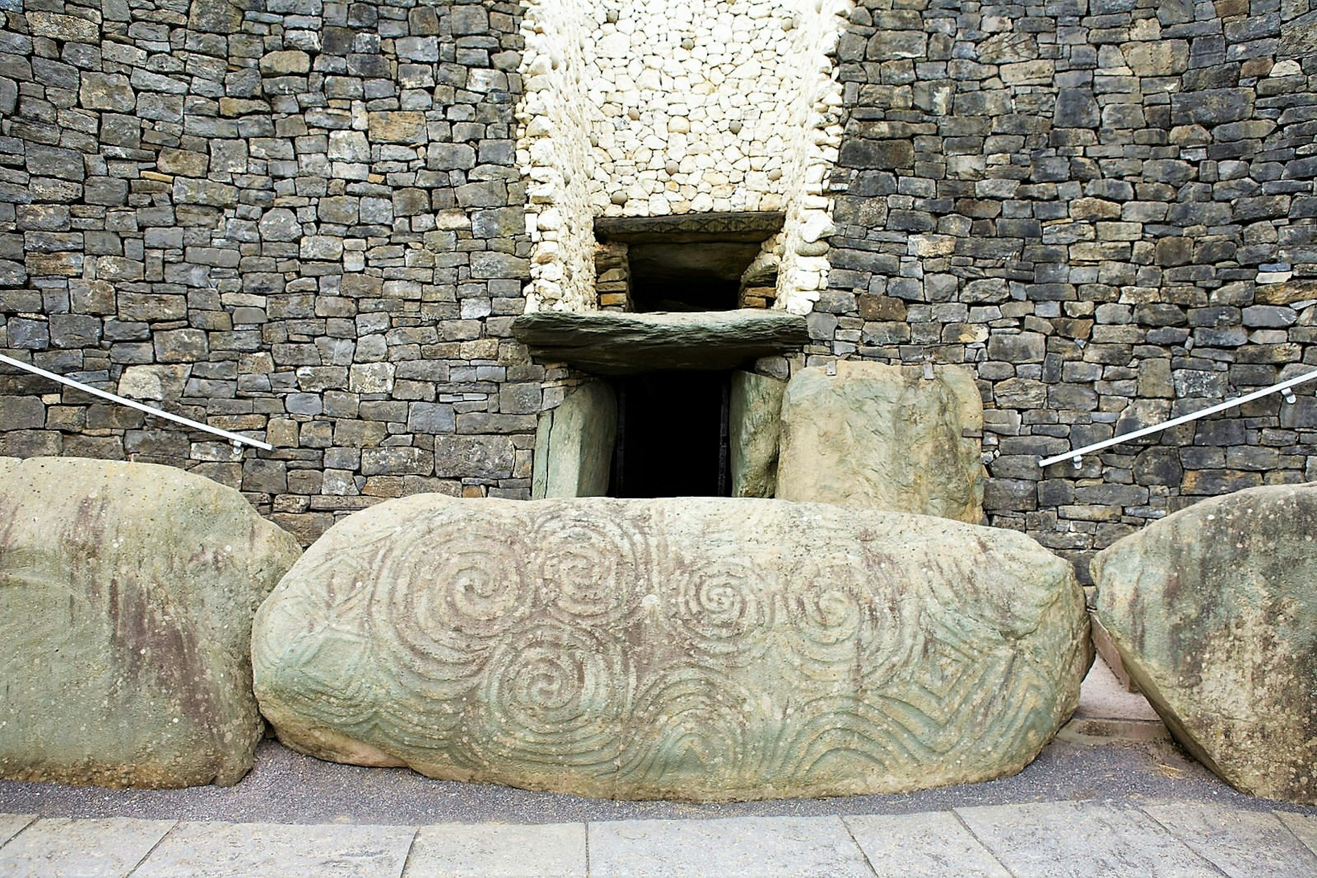 Giant stones mark the entrance to Newgrange in Brú Na Bóinne ancient site in Meath, Ireland. 