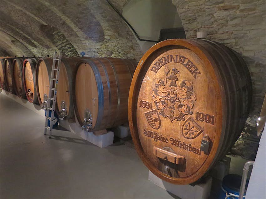 Features - IMG_1050-958edfa298ff Handcarved Franconian oak barrels at Weingut Brennfleck in Sulzfeld, Germany. The huge barrels are housed in a stone basement