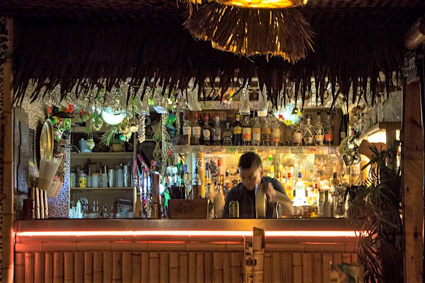 Man making drinks in the Tiki Bar