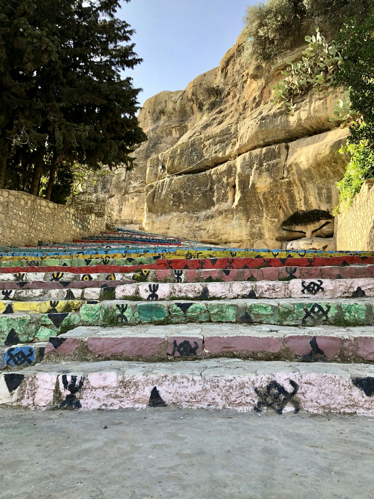 Letters of the Berber alphabet are painted on the stairs in Kesra, central Tunisia