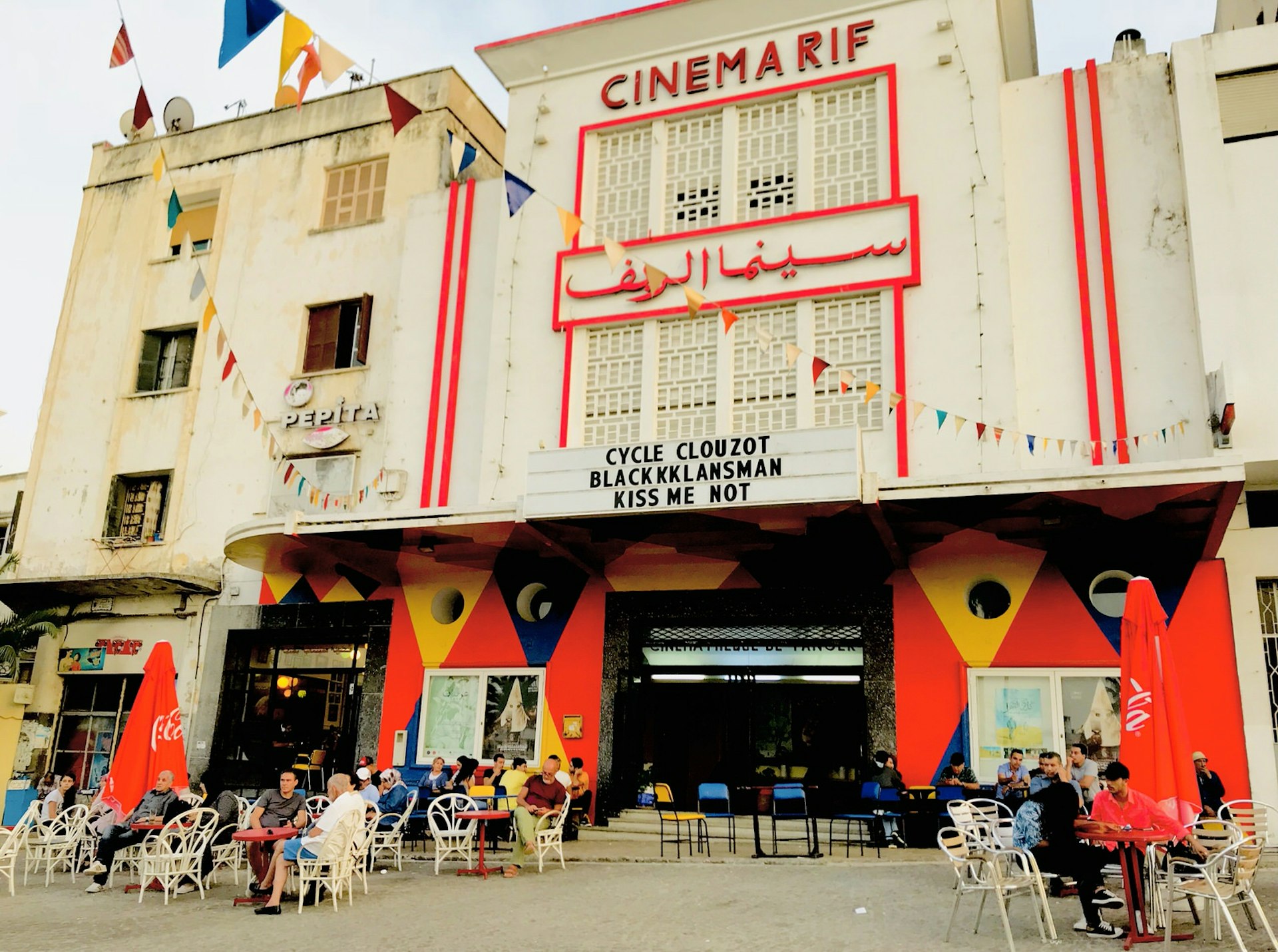 Tables and chairs outside Cinema Rif, Tangier, Morocco