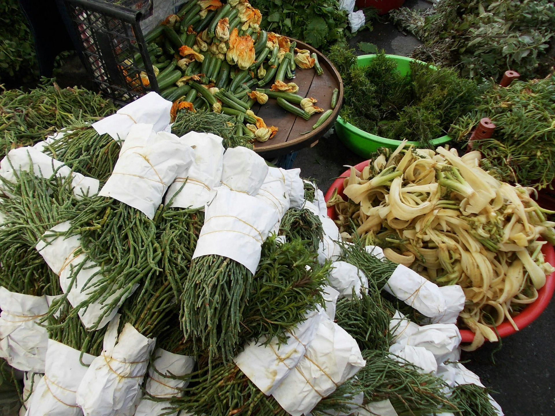 Wild greens stacked in a market in Urla, Turkey