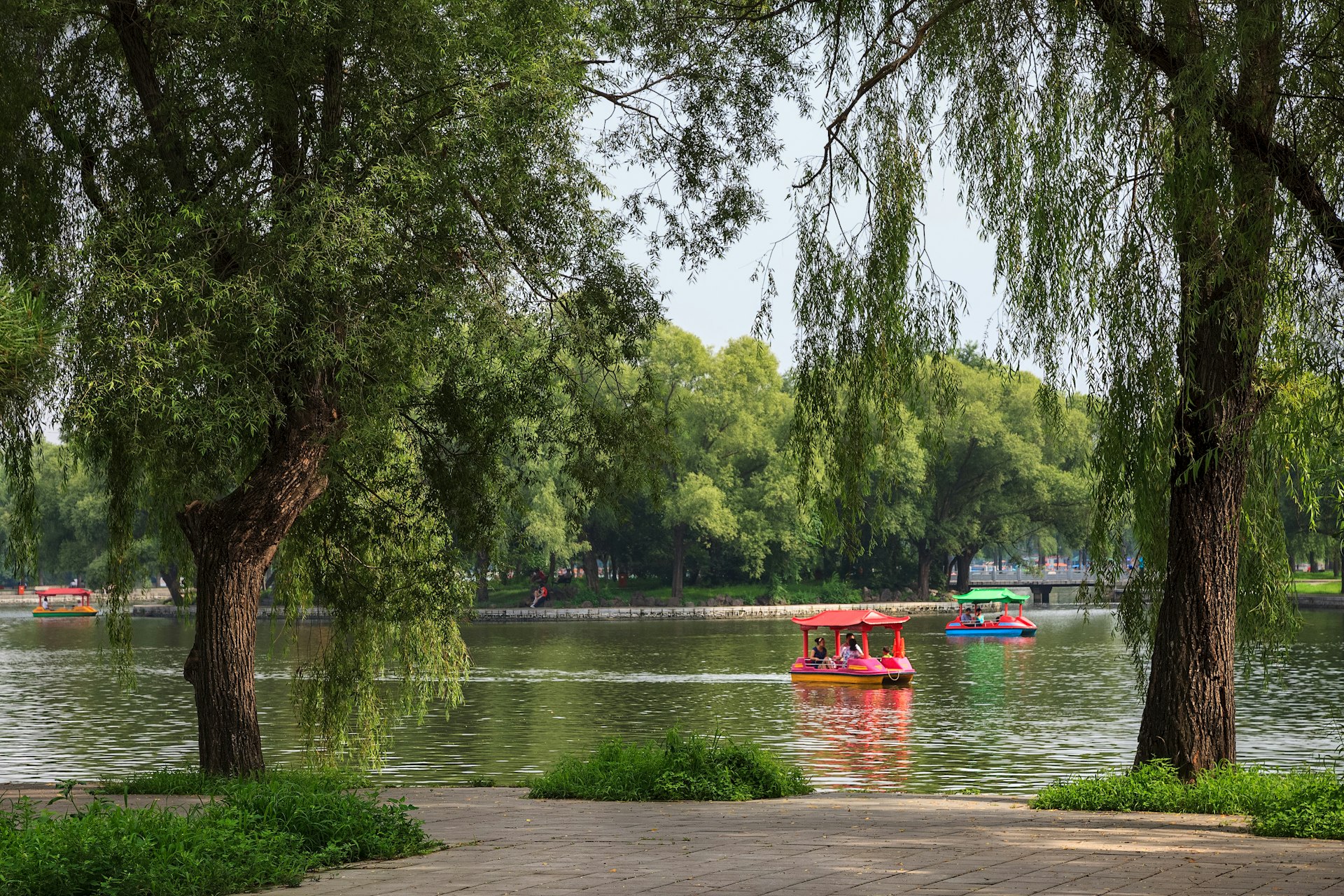 Features - People having a good time on a boats in Beiling Park, Shenyang, China