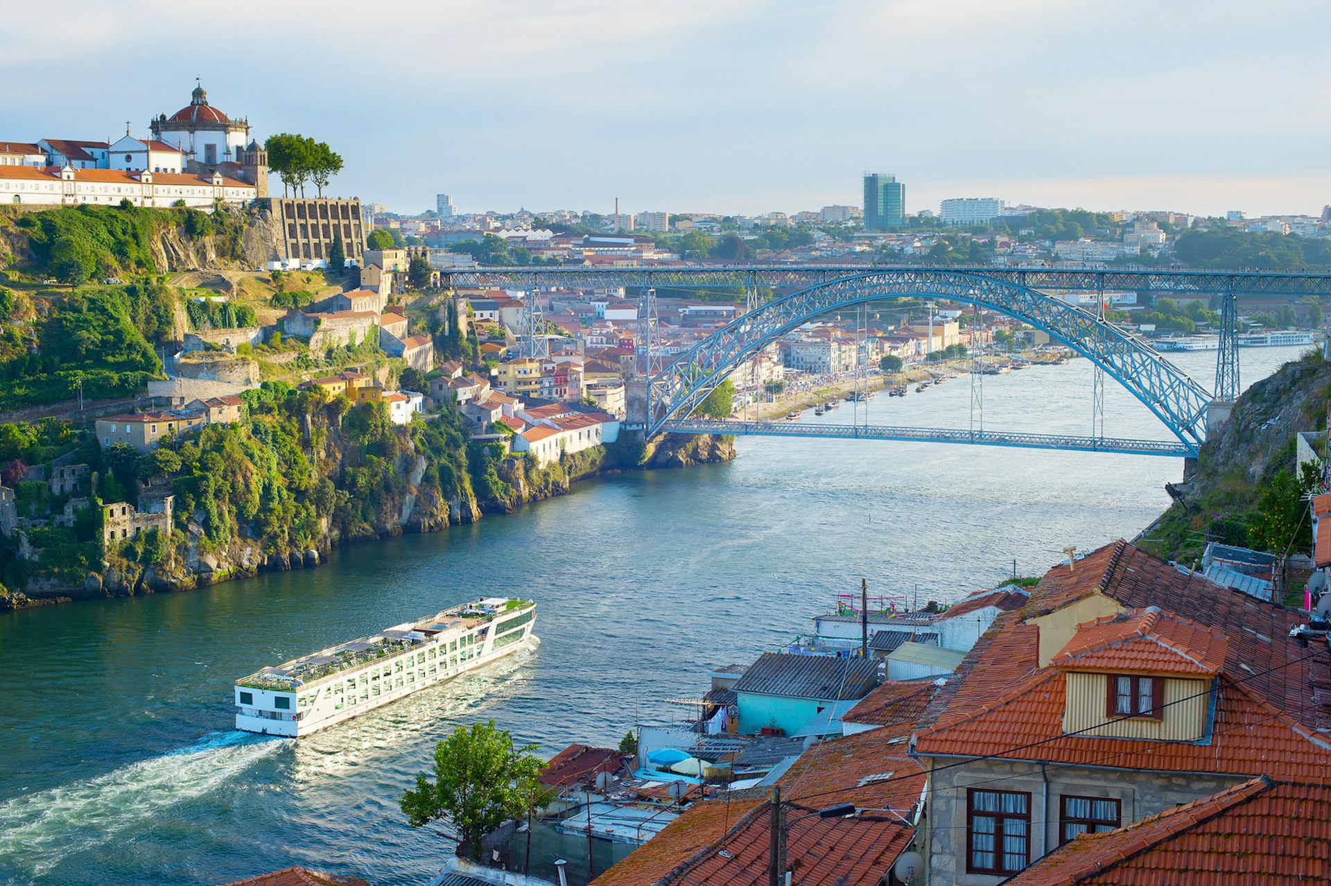 A cruise ship arrives in Porto on the River Douro
