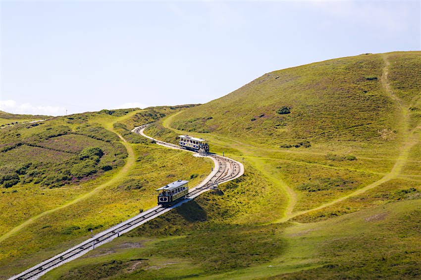 Features - Great Orme tramway moving across picturesque hills, Llandudno, Wales